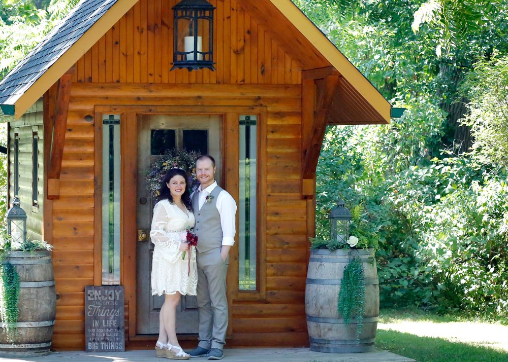 Heather and Brendon posing in front of the chapel