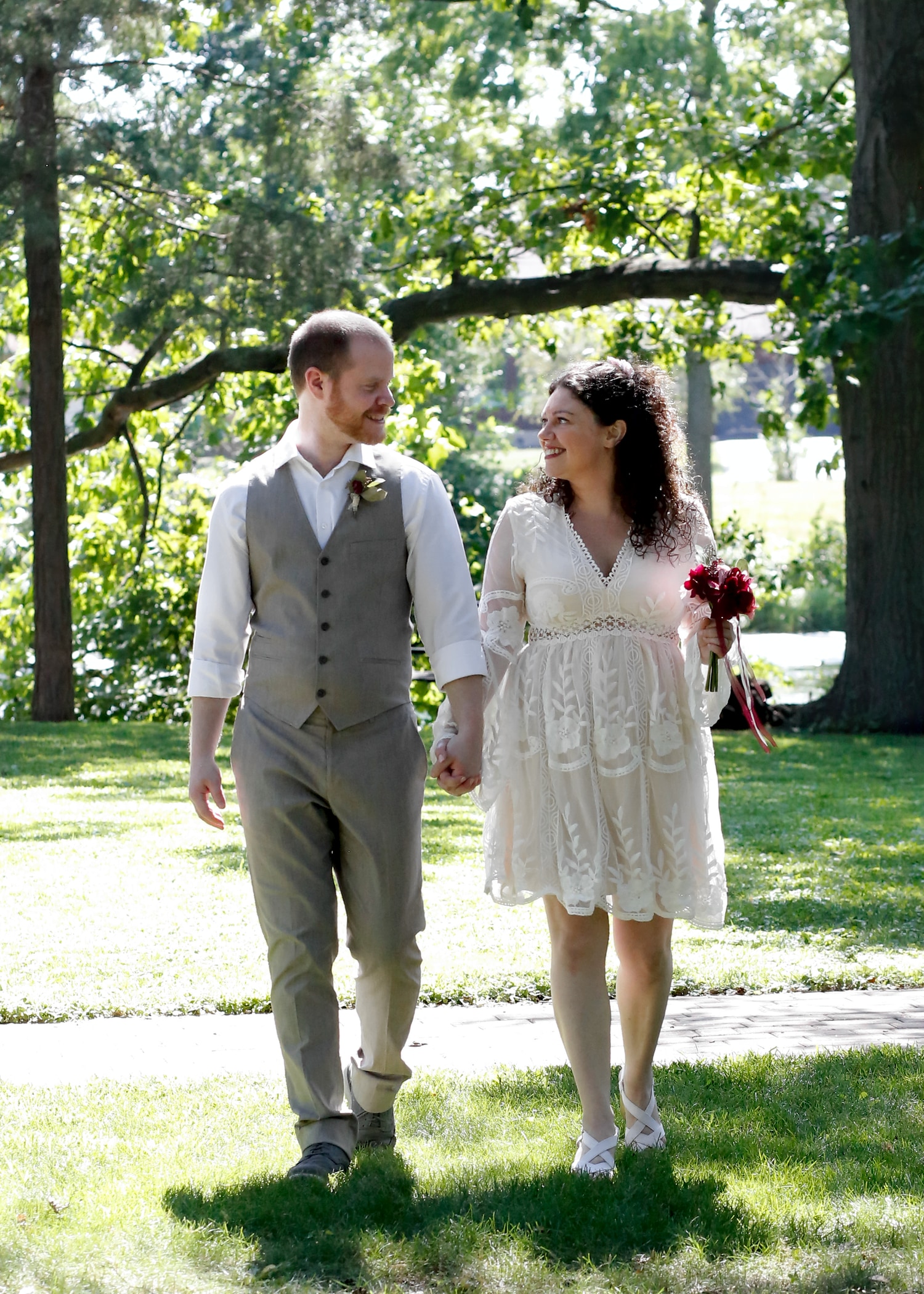 Heather and Brendon walking while looking at each other